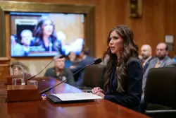 Kristi Noem's proud MAGA bimbo act builds on the legacy of Sarah Palin